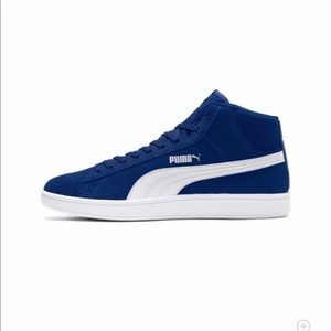 Brand new Pumas in box never wore